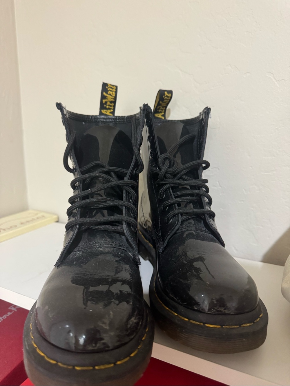 Dr. Martens Black Patent Lace-Up Boots with Yellow Stitching